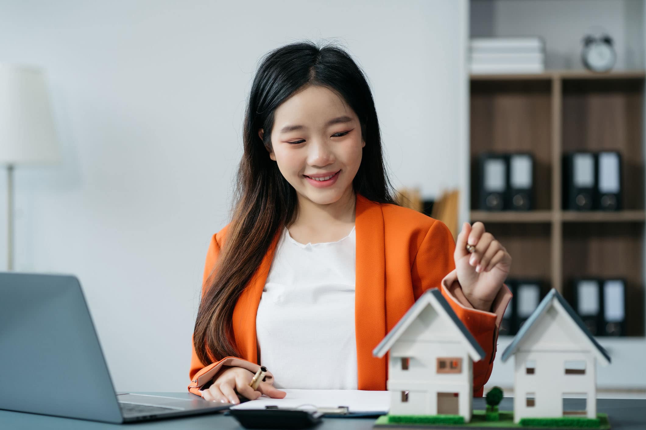 Considering buying a home, investing in real estate. Broker signs a sales agreement. agent, lease agreement, successful deal. Calling leads for real estate: Buyers considering a home or investment, brokers signing sales agreements, agents closing successful deals.